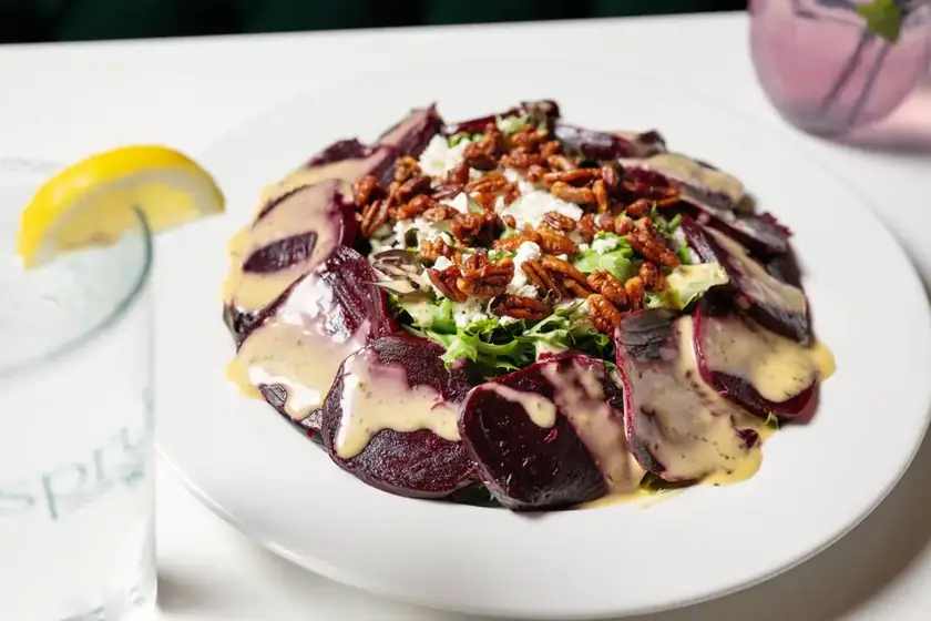 Roasted beet carpaccio with feta and glazed nuts